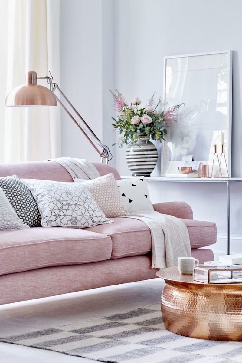 Pink sofa with copper marble table