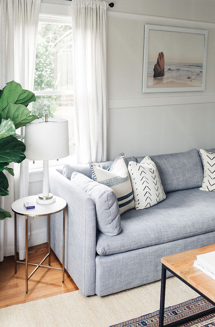 Shelter Sofa and white marble side table via GG