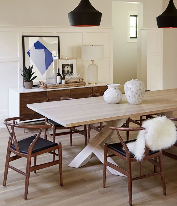 Dark brown wishbone chairs dining room via Nam Dang-Mitchell Design