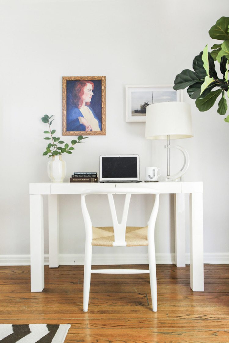 White wishbone chair at home office desk via Homepolish