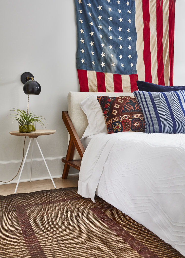 American flag behind bed via semikahtextiles