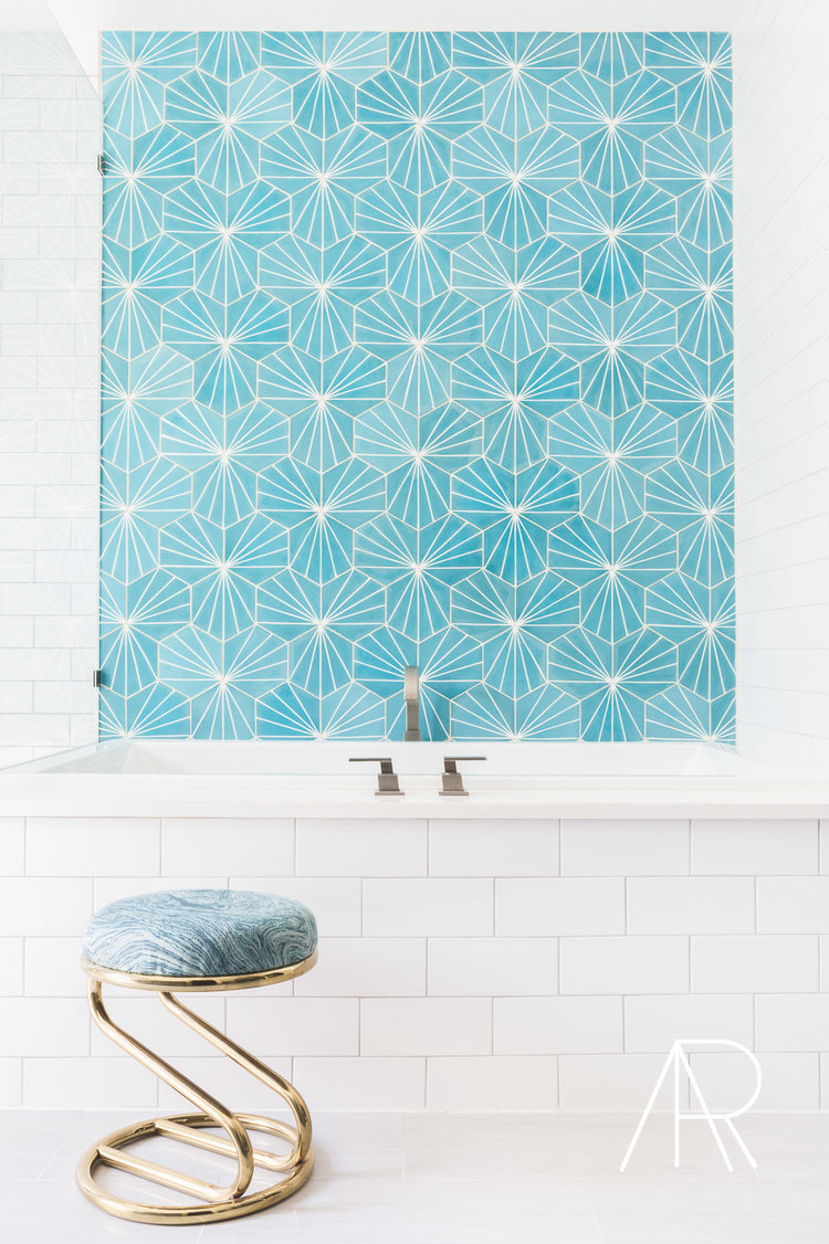 Blue Hexagon tiles above Bathtub via Alyssa Rosenheck