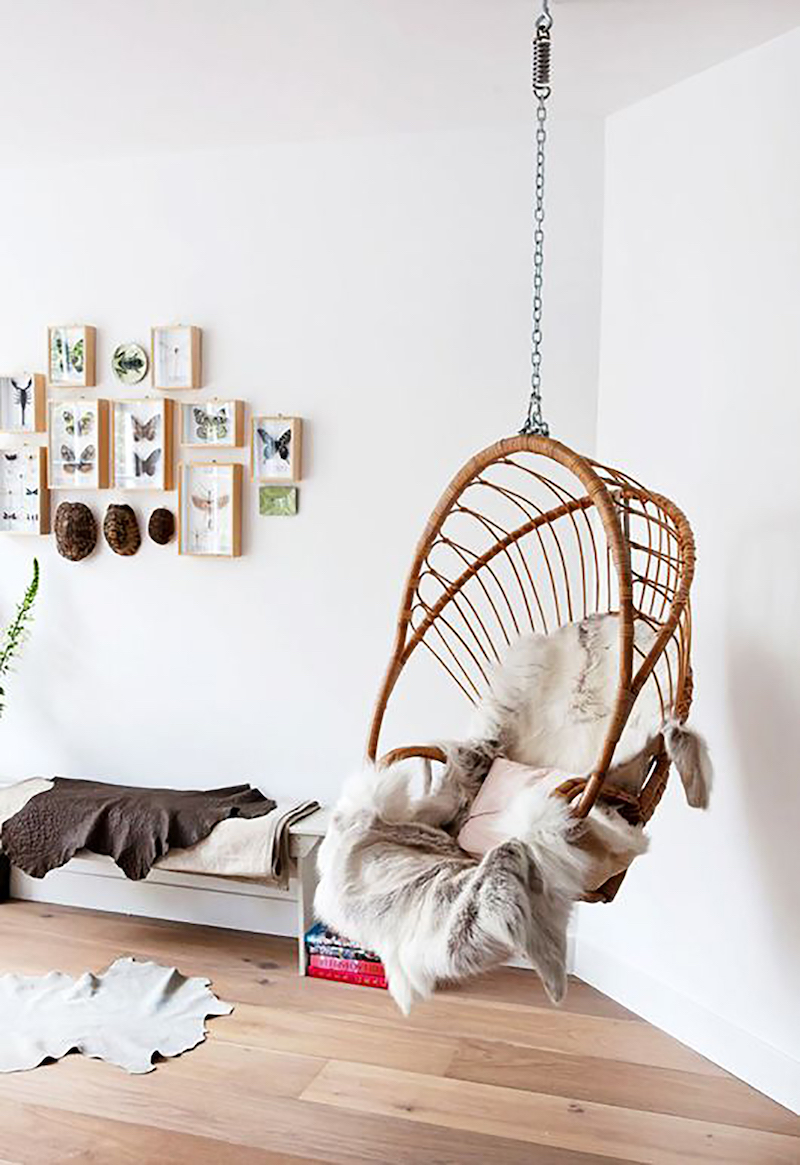 Brown rattan swing chair via Scent of Obsession