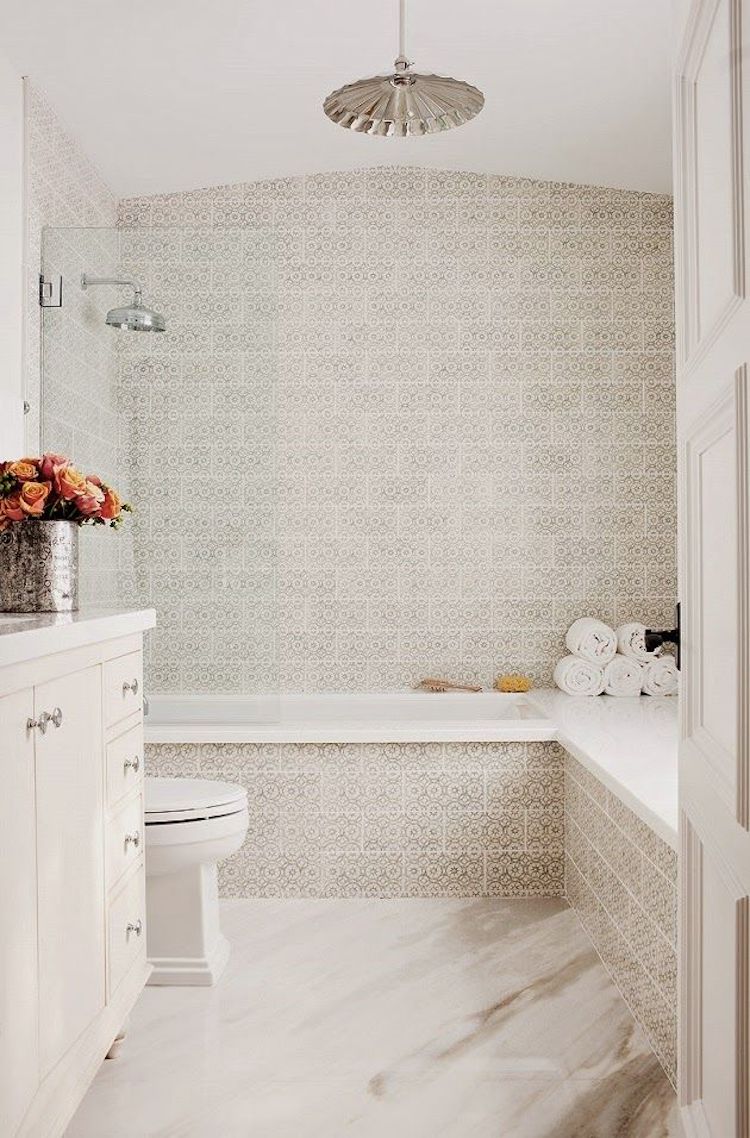 Spanish tiling in a neutral bathroom via Kishani Perera