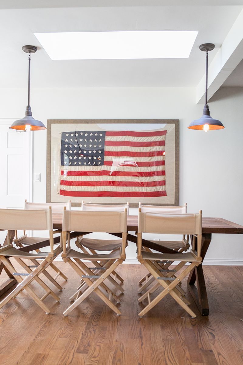 Wood dining table with framed American flag