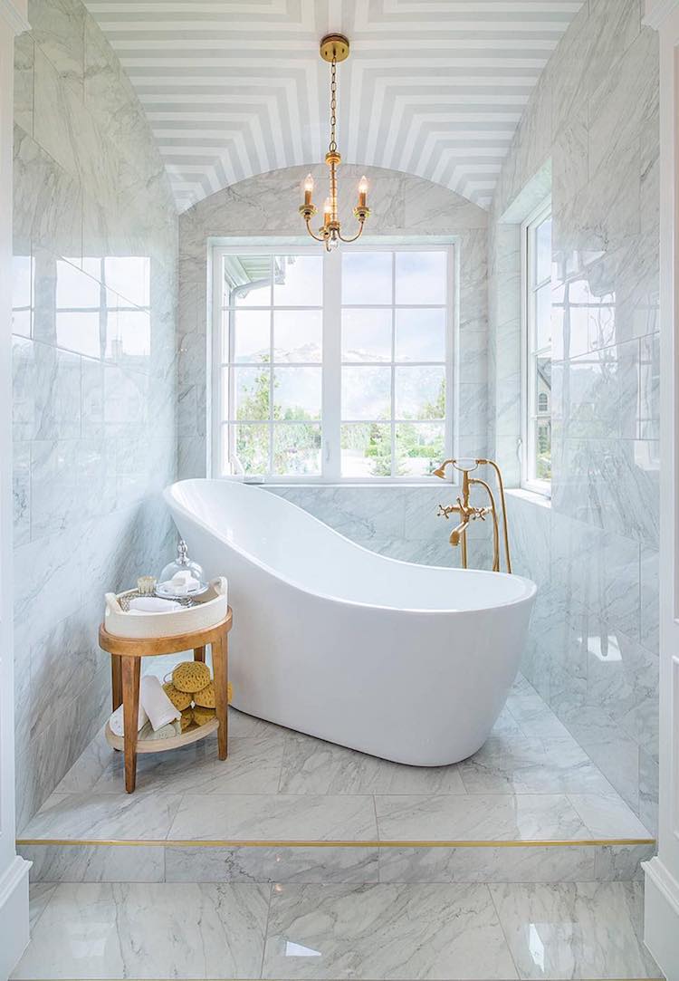 Brass and marble freestanding bathtub JCD Custom Home Design