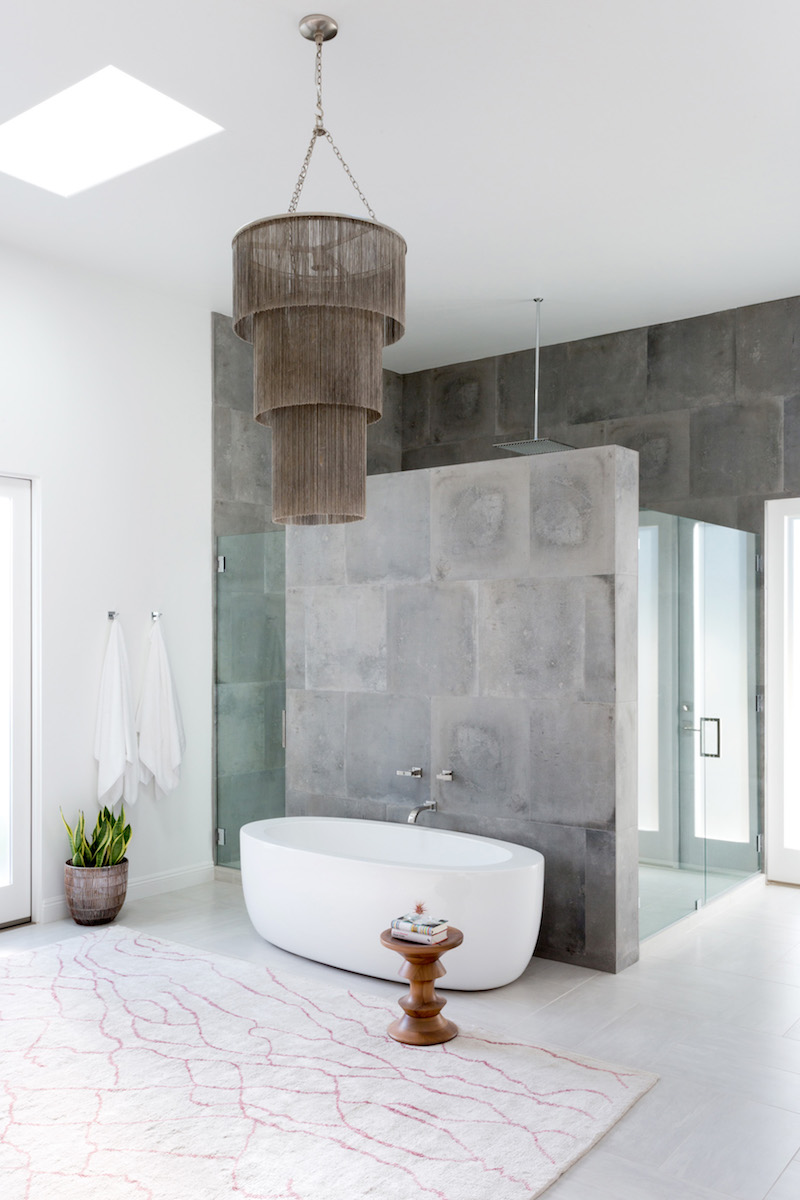 White tub with dark brown chandelier via Amy Elbaum