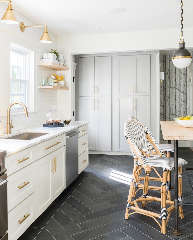 A Stunning Marble Kitchen With Gray Herringbone Floors Brass Hardware