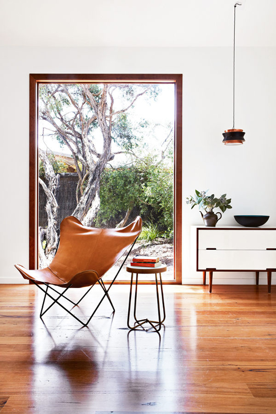 Brown leather butterfly chair