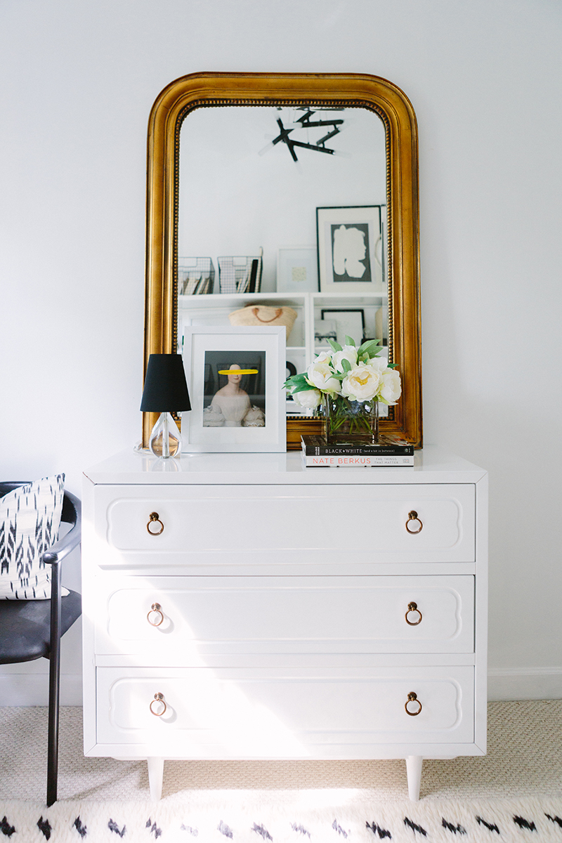 French-Inspired Office with White Dresser and Thick Gold Mirror