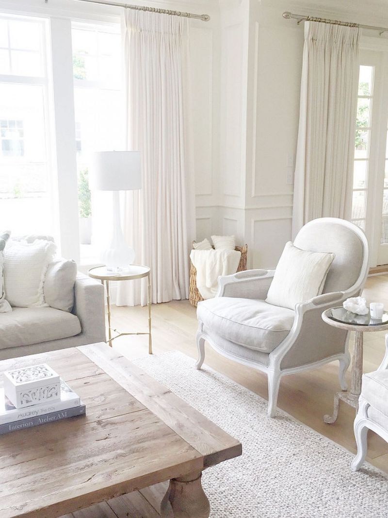 Grey and white bergere chair via Our Boat House