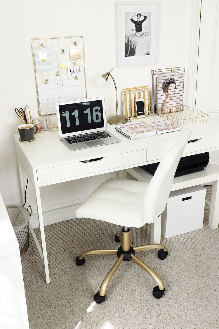 White swivel office chair at desk via Beauty & the Chic