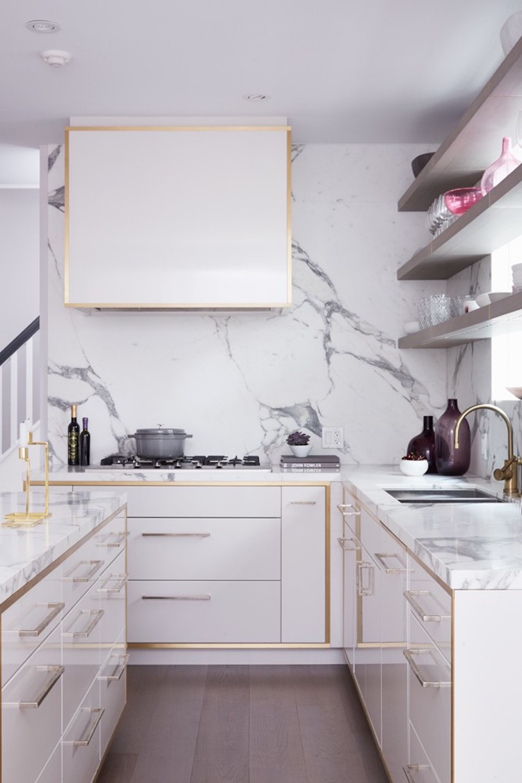 White Marble Backsplash Kitchen With Gold Hardware Via Tara Fingold 