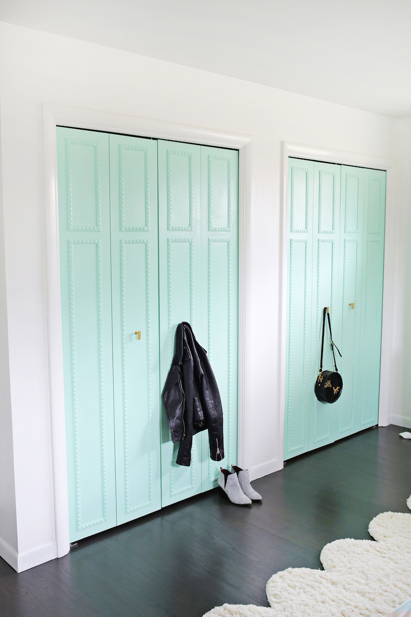 Mint green closet doors via A Beautiful Mess