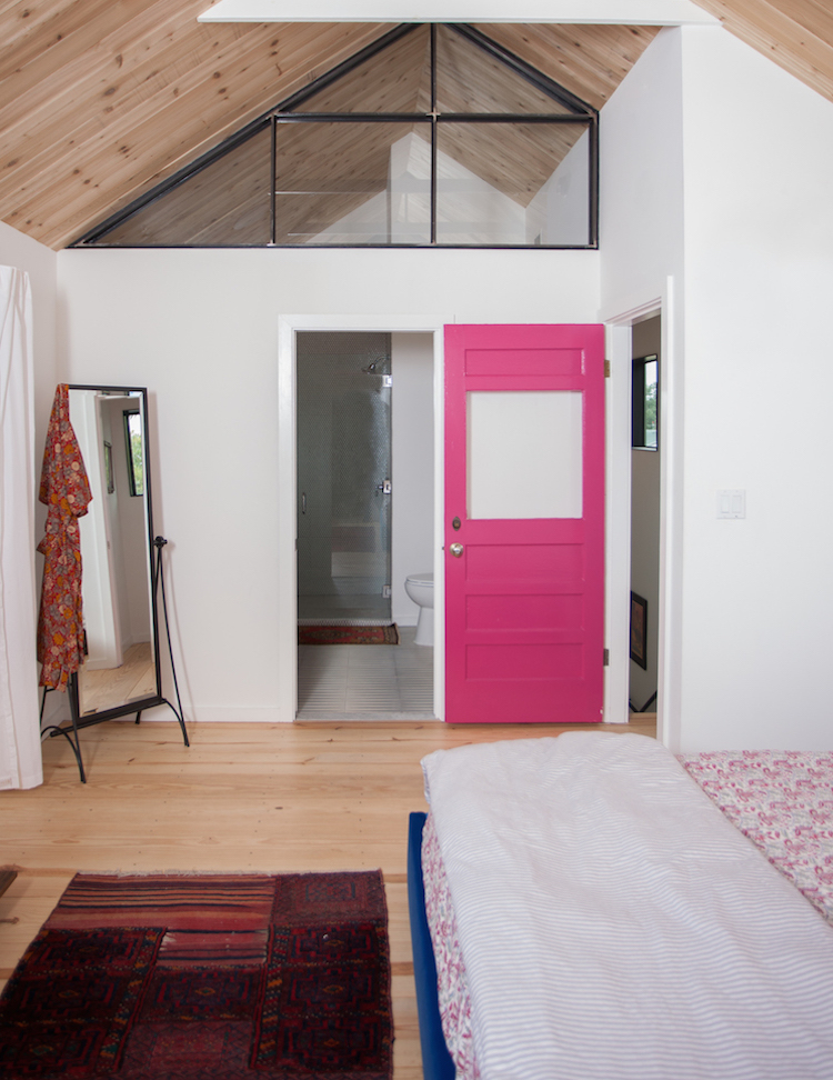 Pink bathroom door paint via Camille styles