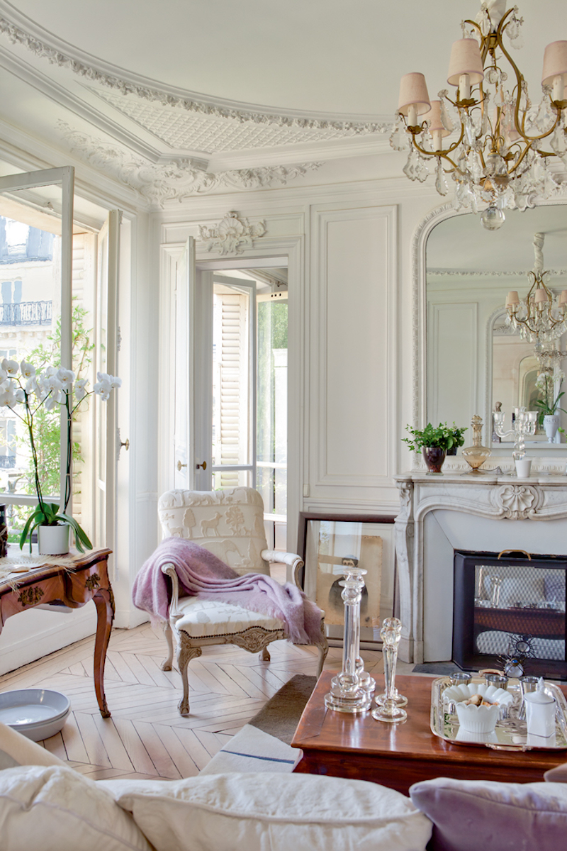 Elegant French Living Room With Marble Fireplace And Moldings 