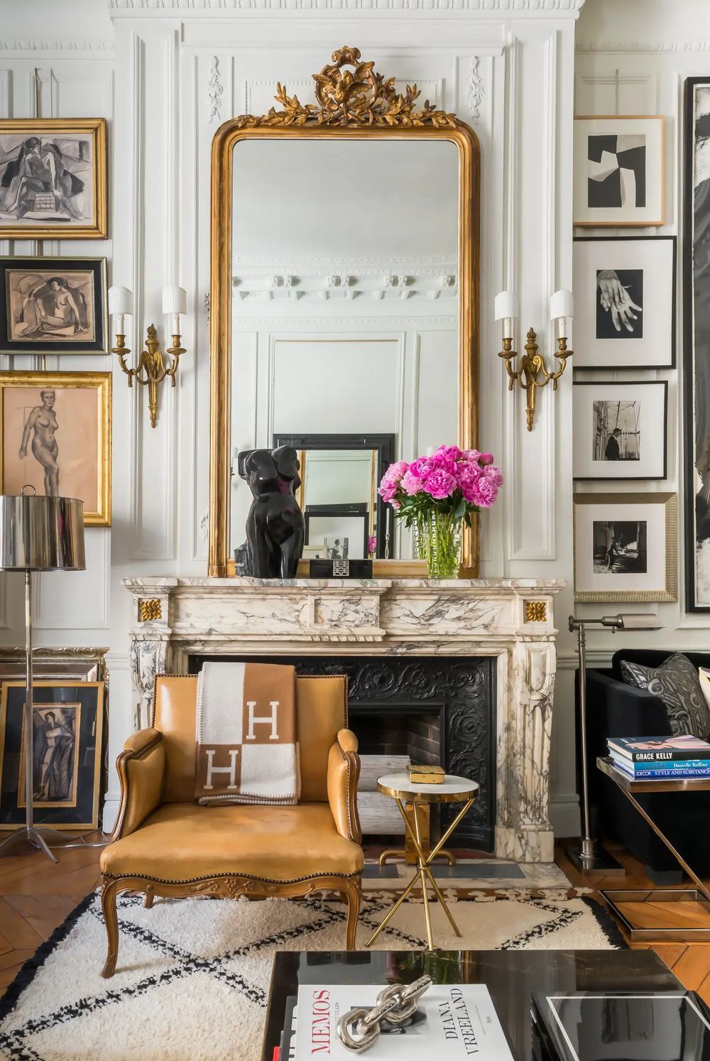 French interior design Gold Mirror above marble fireplace David Jimenez