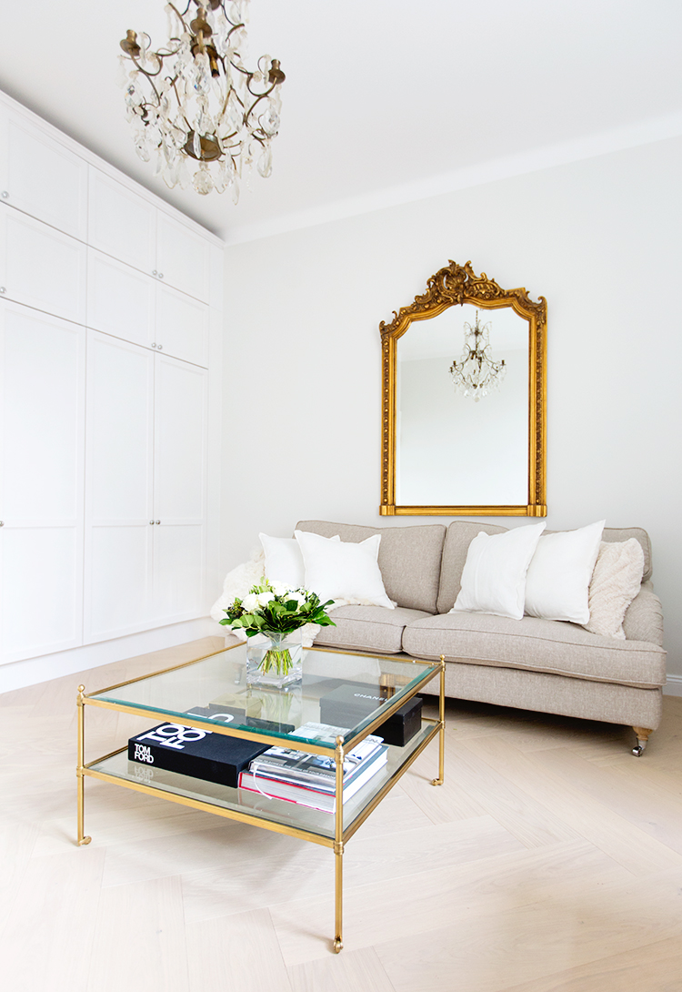 Alexa Dagmar Office with neutral sofa and glass gold coffee table
