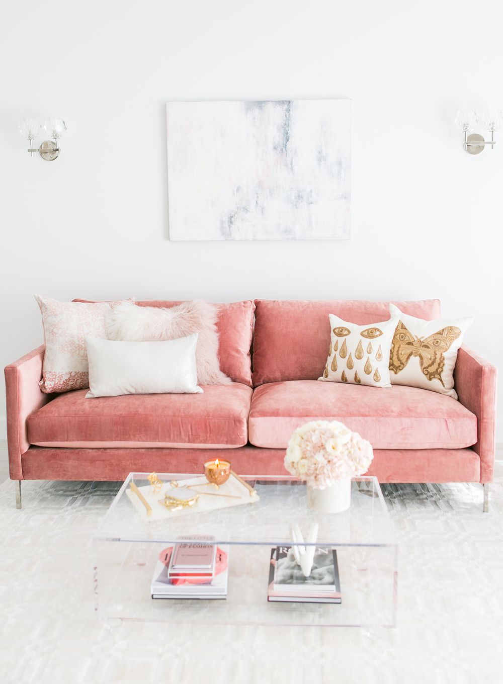 Blush pink couch with lucite coffee table via Sydne Summer