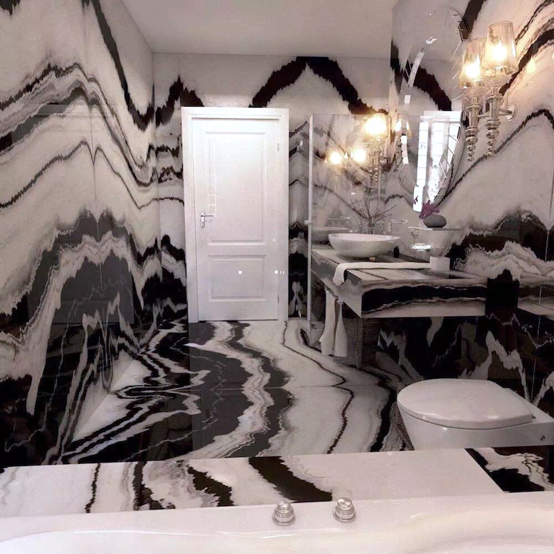 Panda white marble bathroom with white door