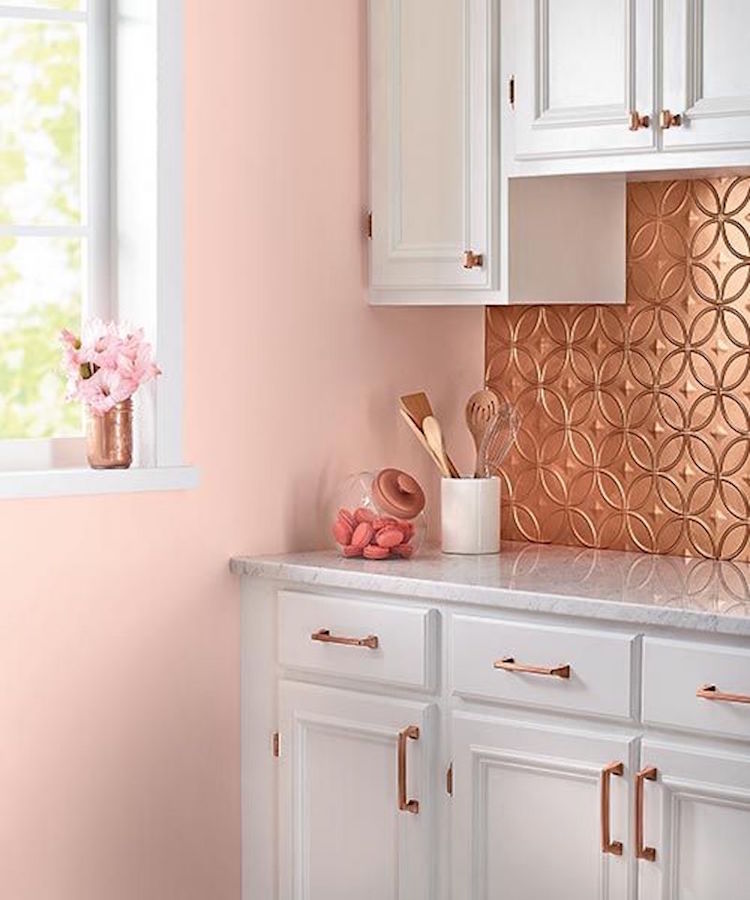 Copper backsplash kitchen with pink walls