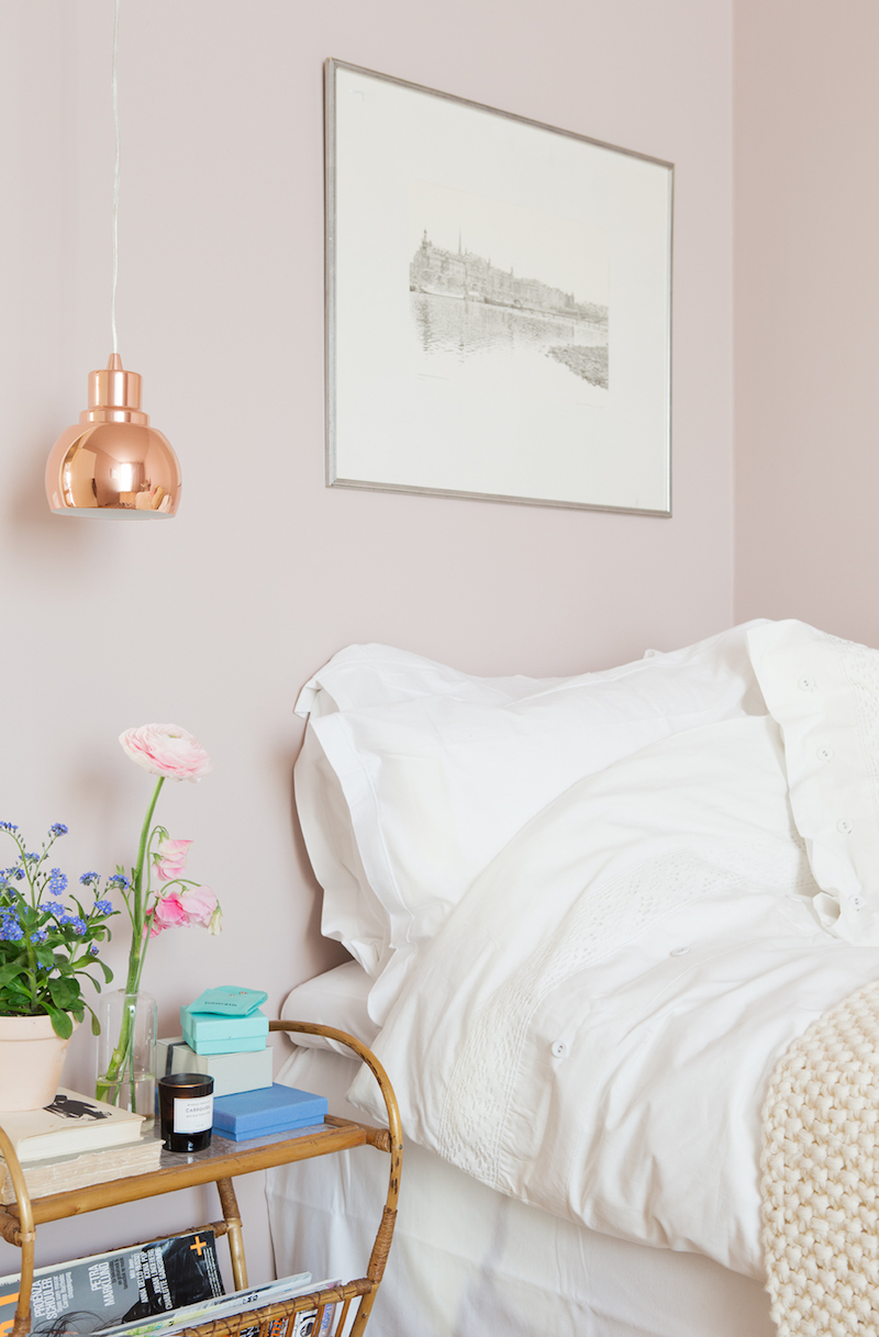 Soft pink bedroom walls with copper light via myamazingthings.com