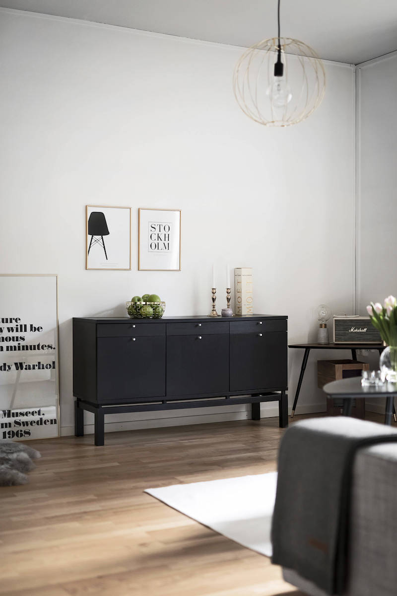 Dark brown sideboard in scandinavian living room