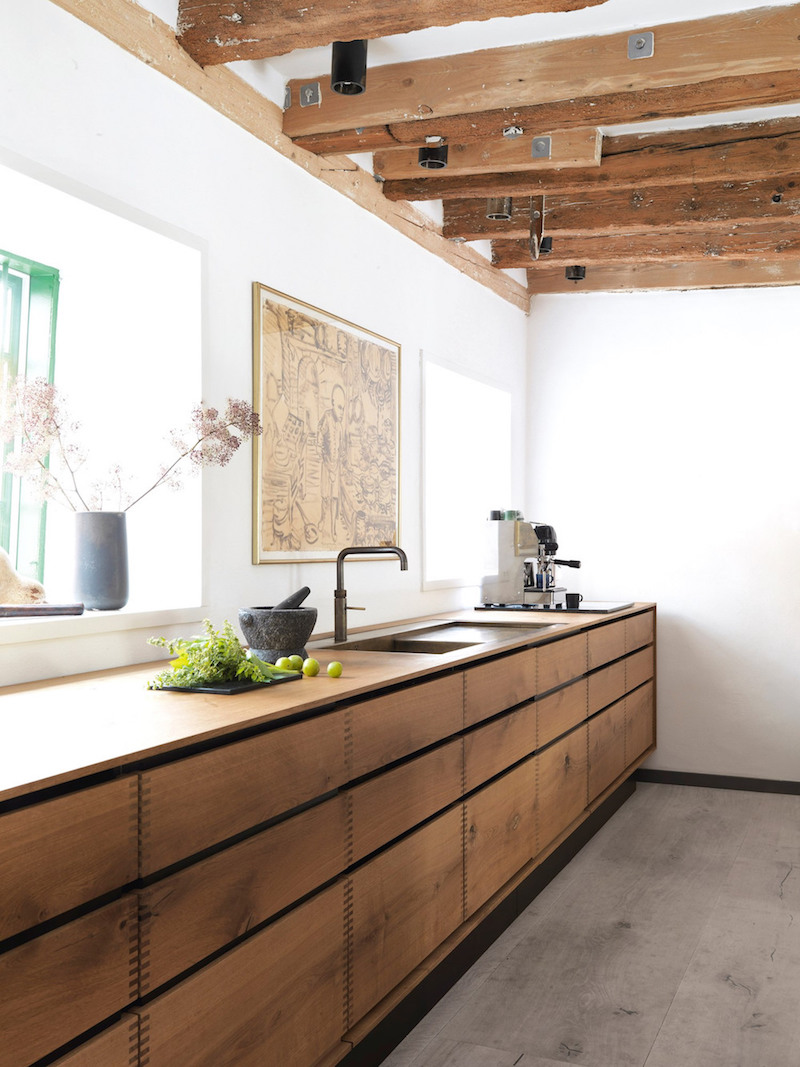 Rustic Kitchen Exposed Wood Beams by Garde Hvalsøe