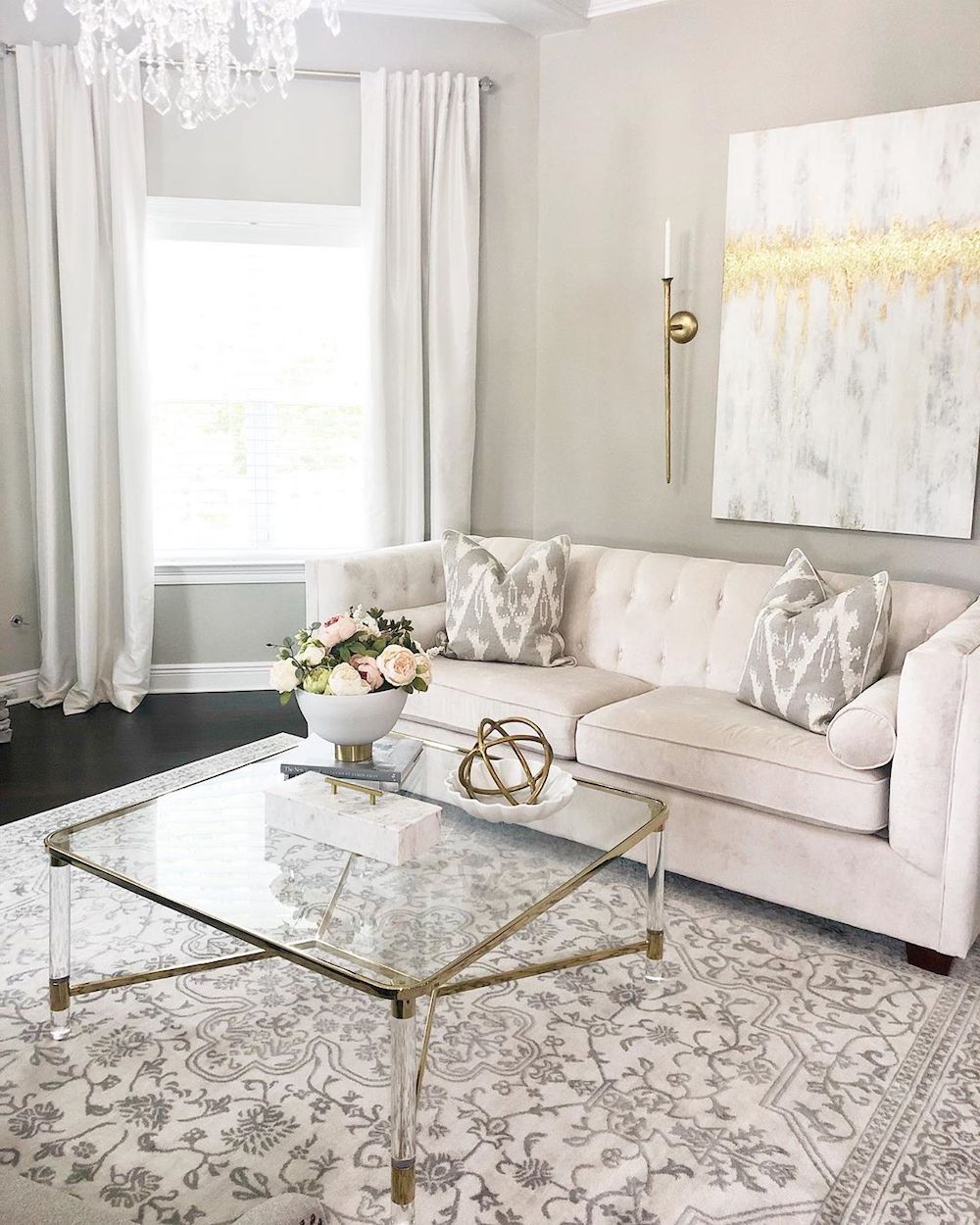 Beige tufted sofa via @saltgrassdecor