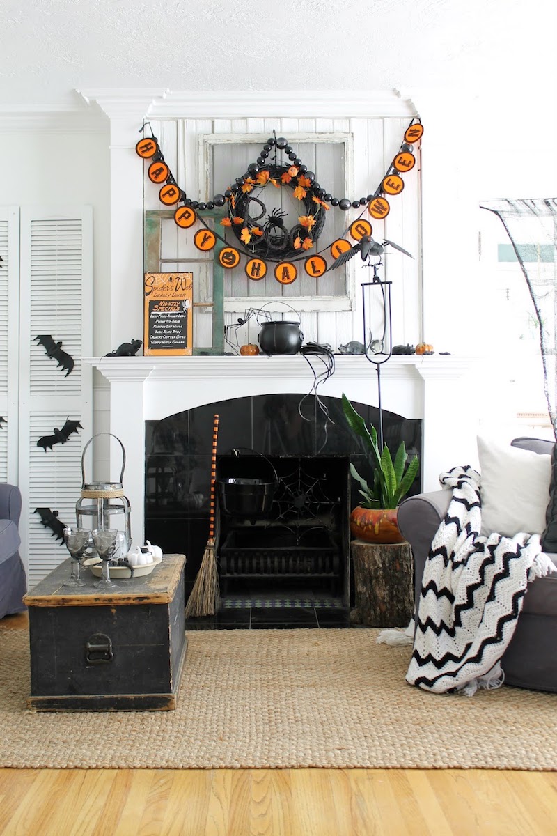 Halloween Decor Ideas Halloween Banner and Witch Broom By Fireplace