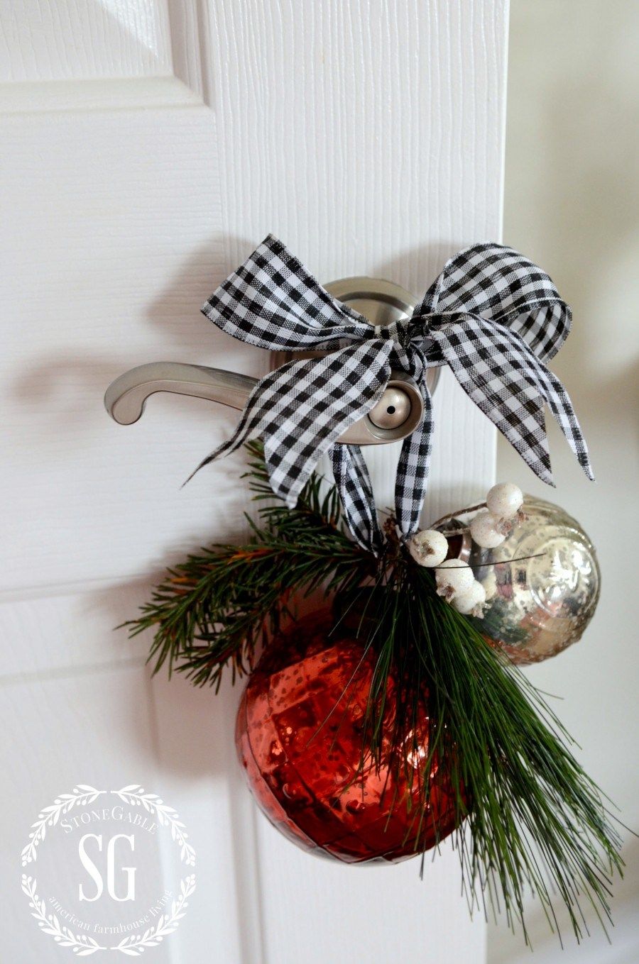 Christmas Ornaments around the Bathroom door Handle via StoneGable #ChristmasDecor #ChristmasBathroom