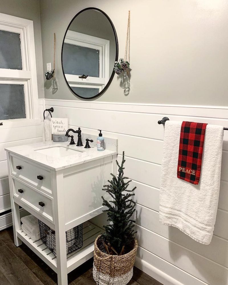 Christmas Tree in Basket and Red Peace Towel in Bathroom via @midcentury_farmhouse