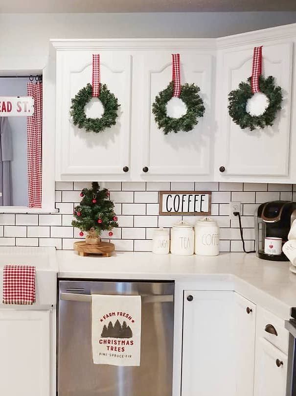 Christmas Wreaths on Kitchen Cabinets @ourcozycottage