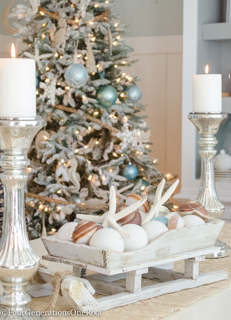 Coastal Christmas Centerpiece in Nautical Dining Room via fourgenerationsoneroof