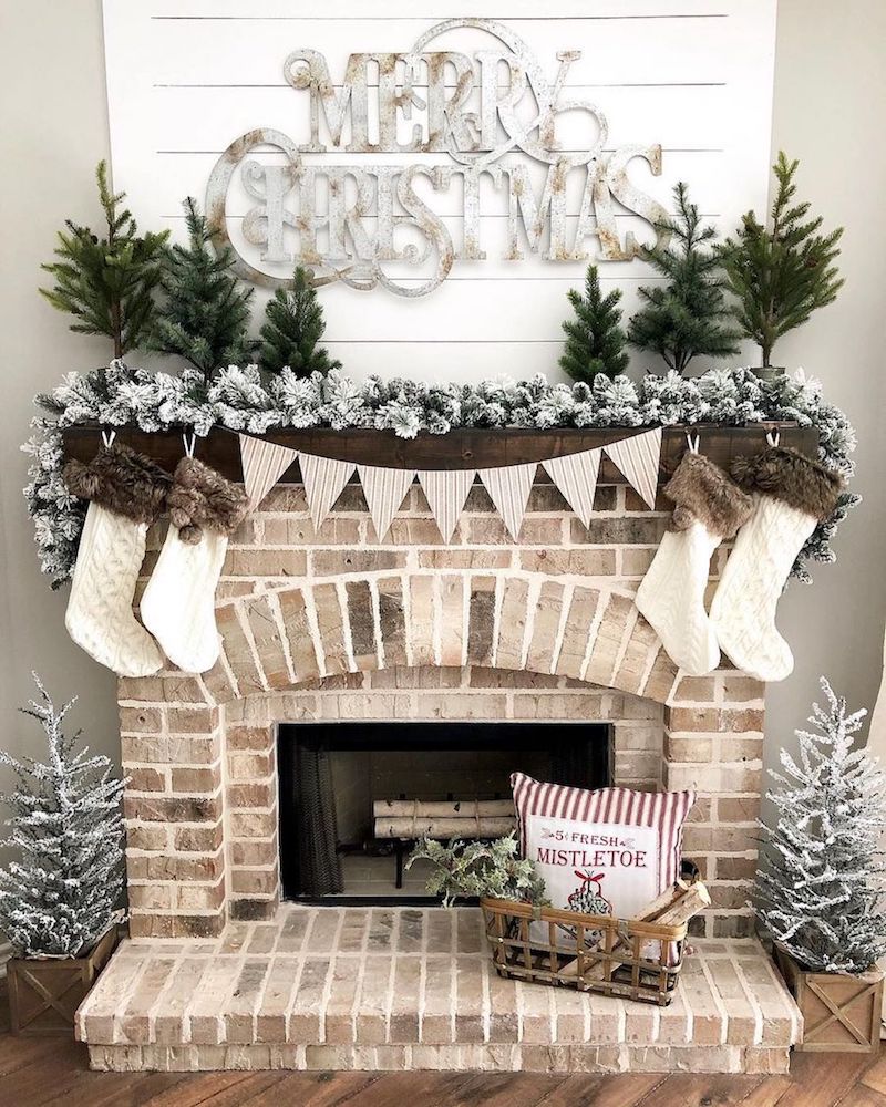 Flocked Garland Christmas Mantel via @ourfarmhousestylehome