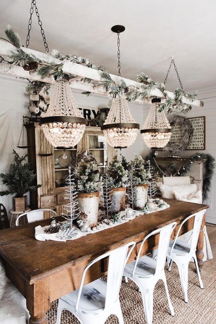 Flocked evergreens in the Christmas Dining Room via lizmarieblog #ChristmasDecor #ChristmasDiningRoom