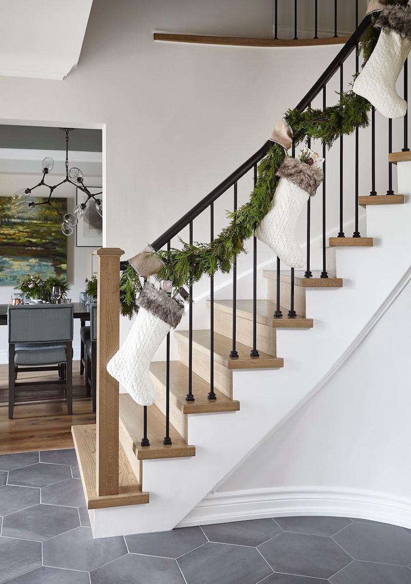 Get 42 Stair Railing Staircase Christmas Decorating Ideas   Garlands And White Stockings Along The Staircase Via @orsipanosinteriors 