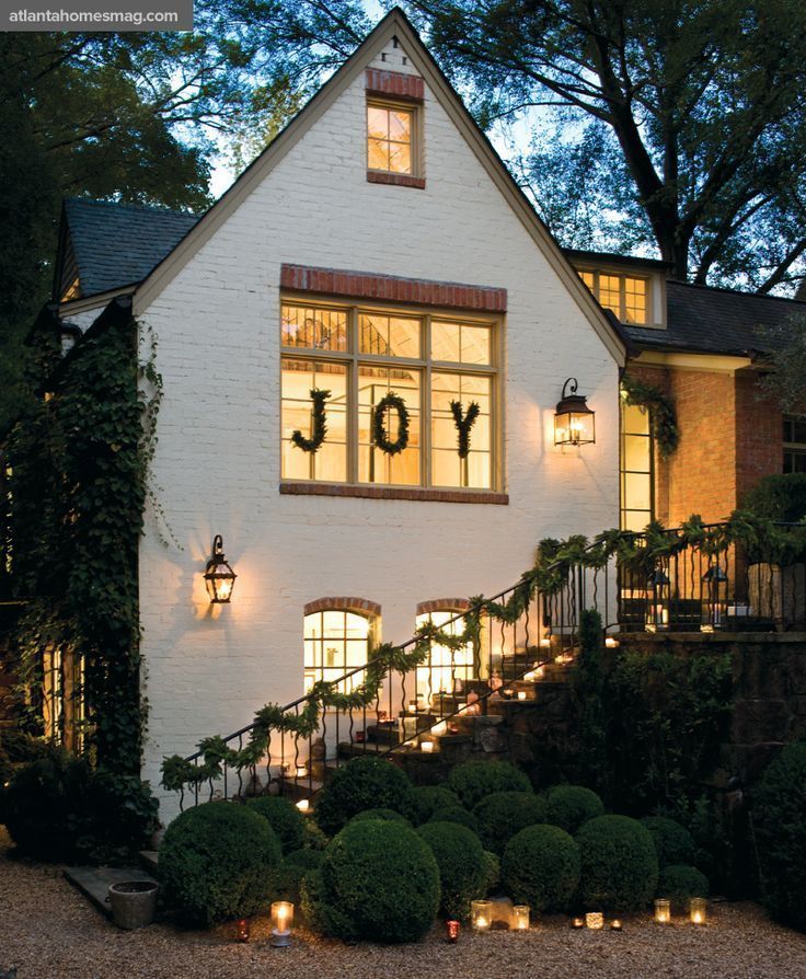 JOY Christmas Outdoor House Decor via atlantahomesmag