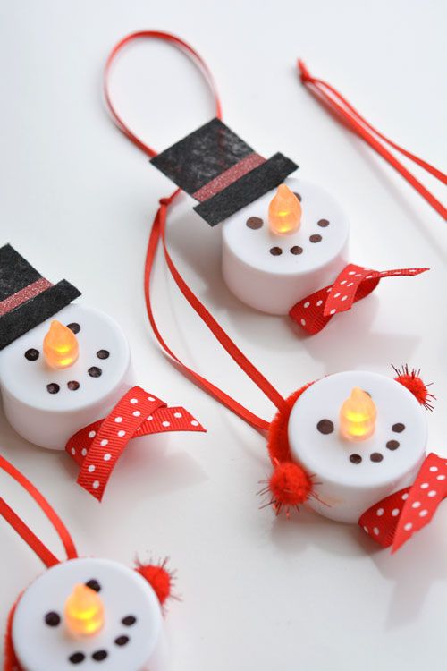 Light-up Snowman Ornaments via onelittleproject #Christmas #ChristmasDecor #ChristmasDIY #DIYDecor