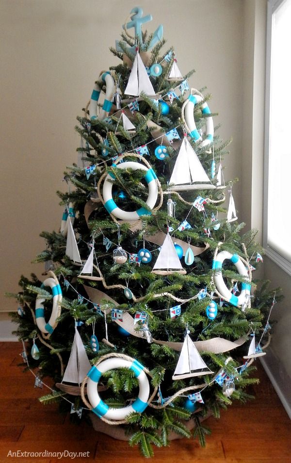 Nautical Christmas Tree Decor with Sailboat Ornaments via anextraordinaryday