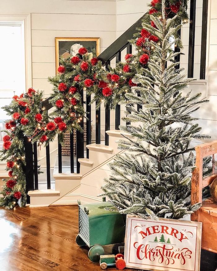 Oversized Green Garland with Red Ornaments Staircase via @farmshenanigans