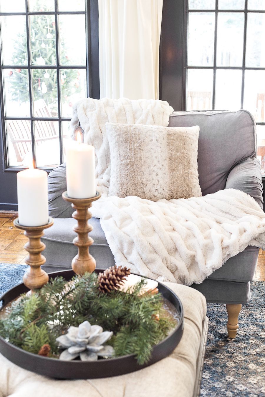 Oversized accent chair with a throw fur banket via blesserhouse