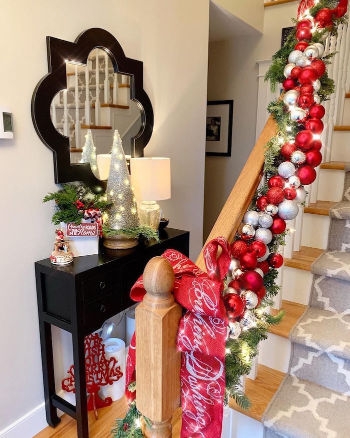 Red and Silver Ornaments Christmas Staircase Decor via @seasideinteriors