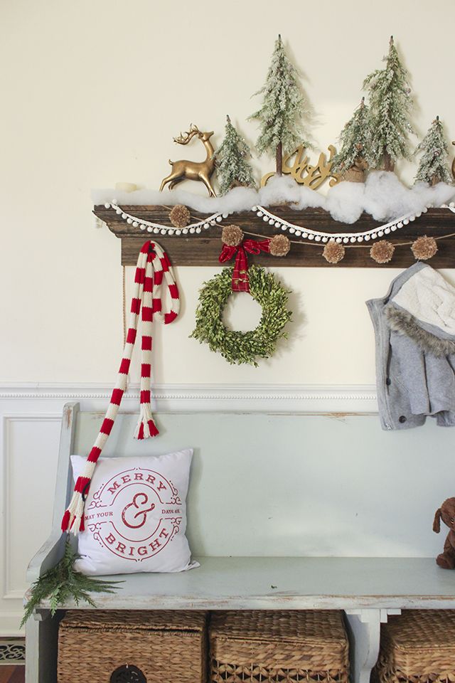 Rustic Bench at Entryway Christmas Decor via shadesofblueinteriors