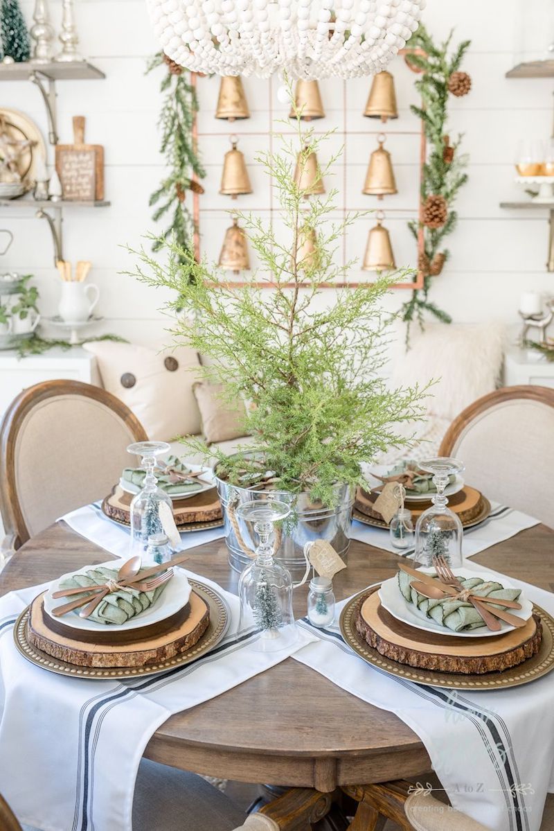 Rustic brown and green Christmas Tablescape via Home Stories A to Z