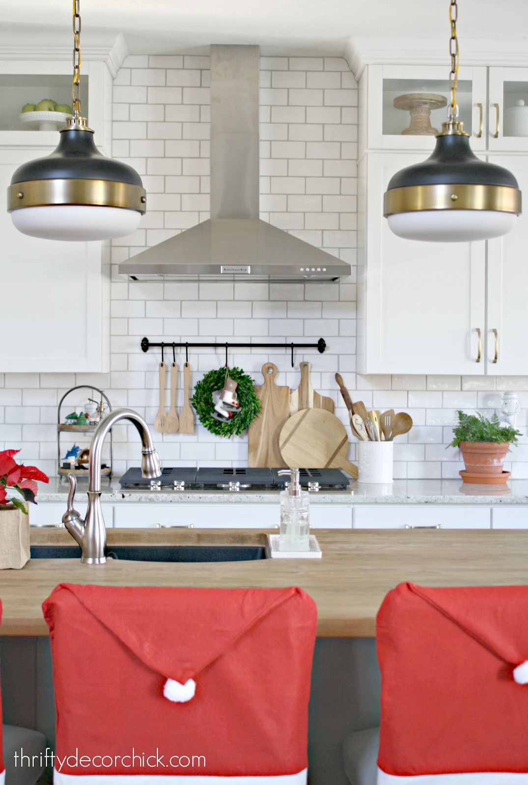 Santa Clause Chair Backs in Kitchen via thriftydecorchick