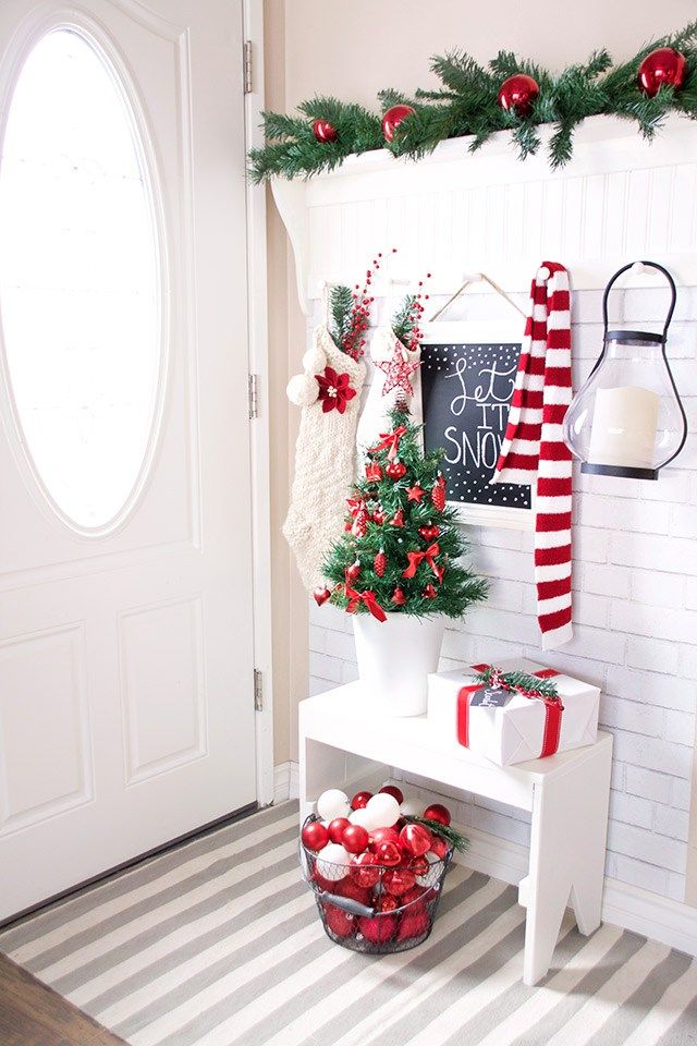 Simple Scandinavian White and Red Christmas Entryway via paint-me-pink #ChristmasDecor #ChristmasHome