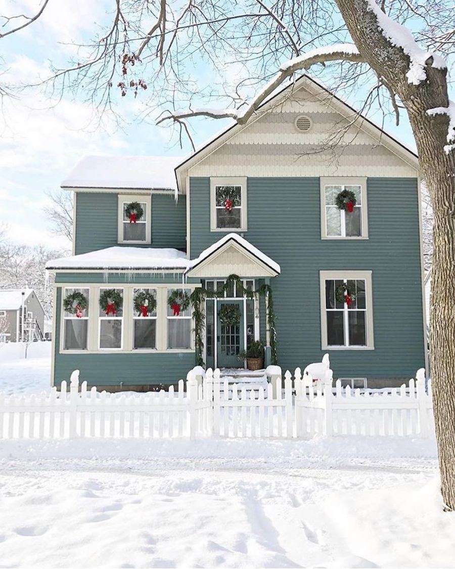 Teal House Decorated for Christmas via @themarketbeautiful