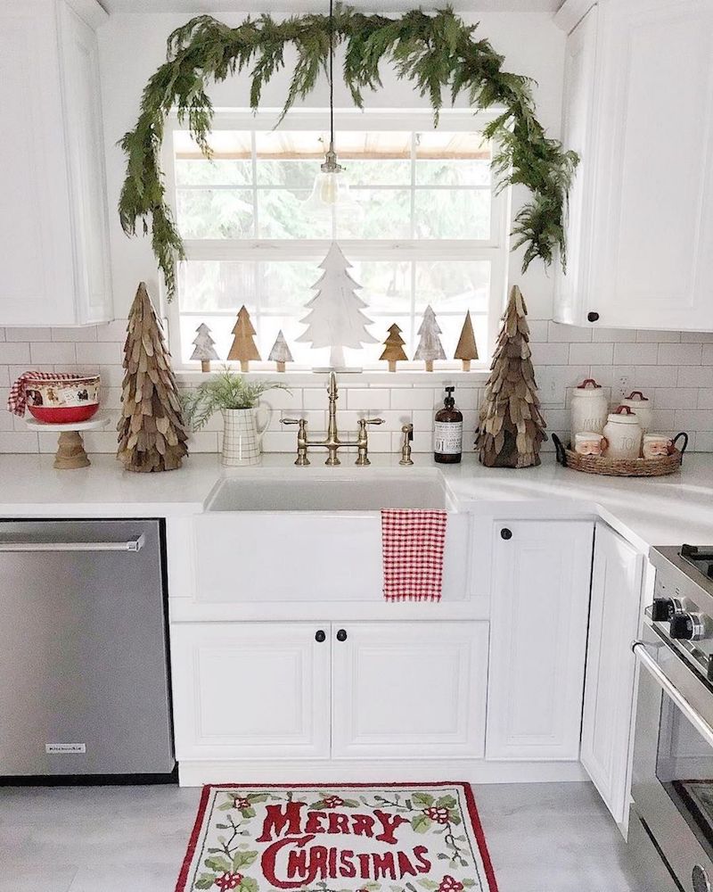 https://curatedinterior.com/wp-content/uploads/2018/12/Wooden-Christmas-Trees-around-the-Sink-via-@thethankfulfarmhouse.jpg