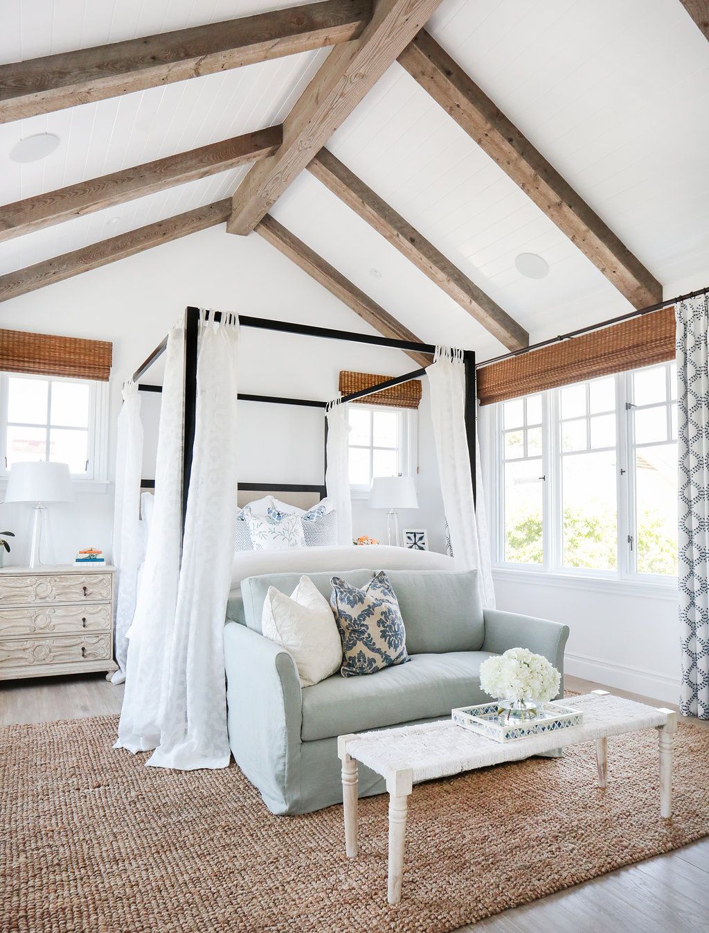 Bedroom with Vaulted Faux Wood Ceiling Beams via blackbanddesign